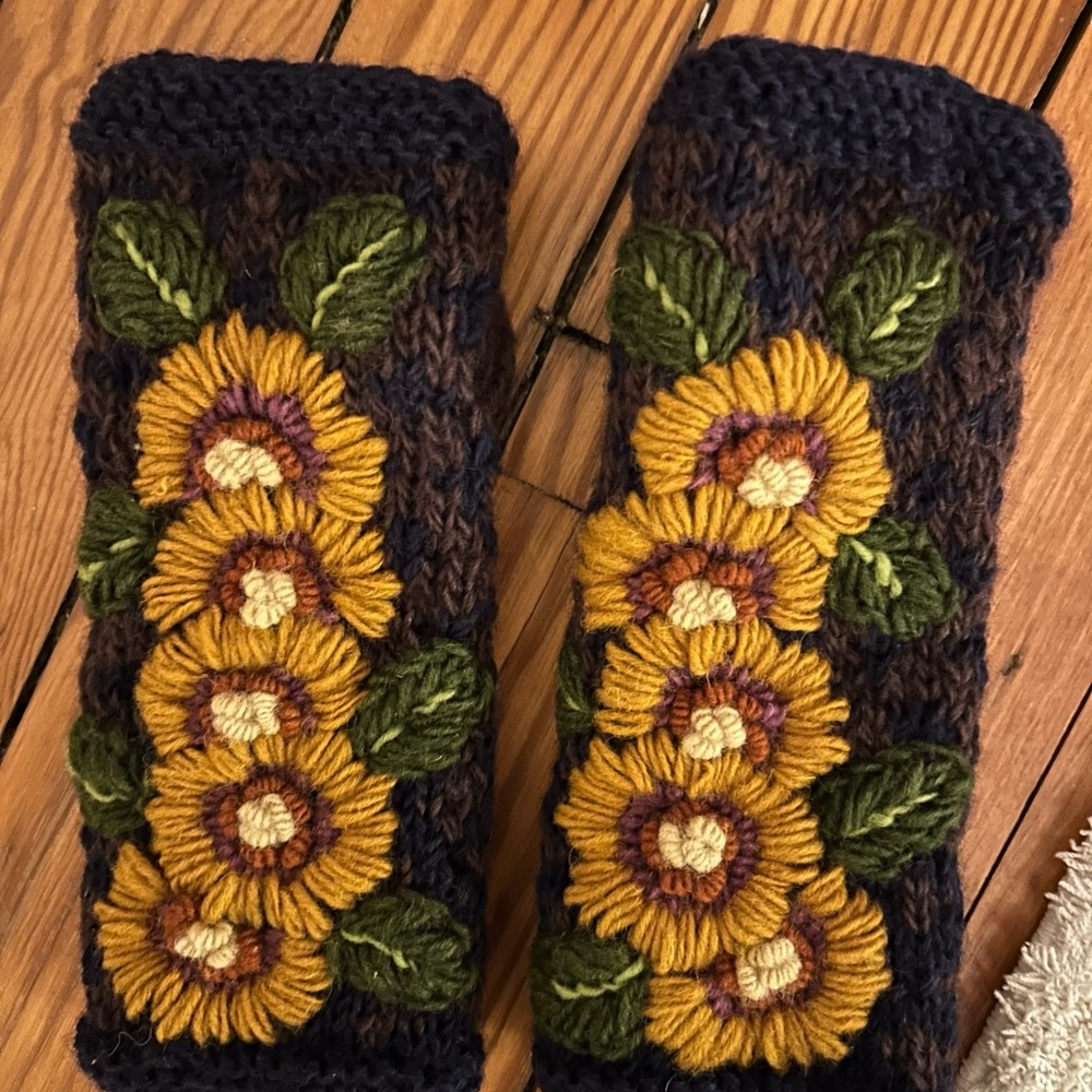 Fingerless beautifully embroidered gloves.